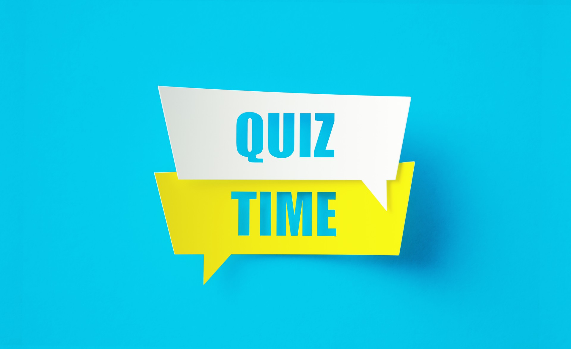 Quiz Time Written Cut Out Yellow And White Speech Bubbles Sitting Over Blue Background